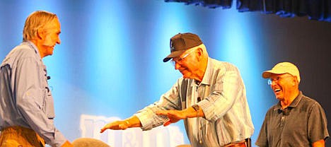 &lt;p&gt;During an evening forum in Oshkosh, Dick Rutan, center, bows before his younger brother Burt, left, as they are introduced, while Mike Melvill, right, is obviously amused.&lt;/p&gt;