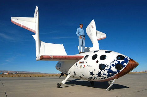 &lt;p&gt;Burt Rutan stands on top of SpaceShipOne.&lt;/p&gt;