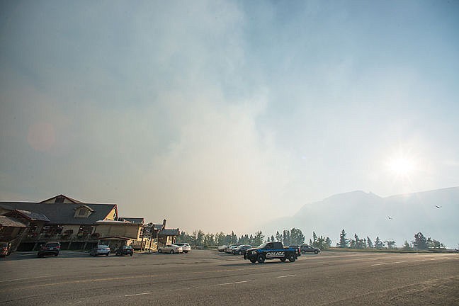 &lt;p&gt;Smoke billows over the Lodge at St Mary from the Reynolds Creek Fire.&lt;/p&gt;