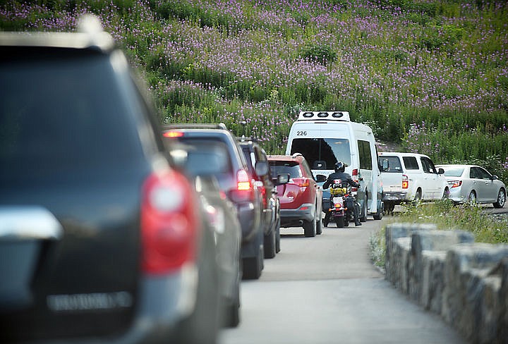 &lt;p&gt;A long line of traffic quickly forms at 9 a.m. as visitors make their way up into Glacier National Park. Going-to-the-Sun Road, the only road through the park and over the continental divide was closed last week from before Logan Pass down to St. Mary on the east side. The road was reopened Tuesday night at 9 p.m. (Brenda Ahearn/Daily Inter Lake)&lt;/p&gt;