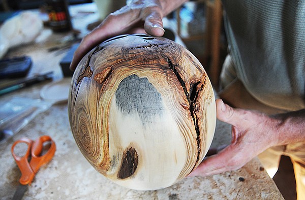 &lt;p&gt;Secrest handles his newest sphere, a piece of juniper wood that
had been struck by lightning. &#147;If you can see something beautiful,
it can make it a little easier to get through the day,&#148; Secrest
says. &#147;That&#146;s what art is supposed to do. It helps you on your
journey.&#148;&lt;/p&gt;