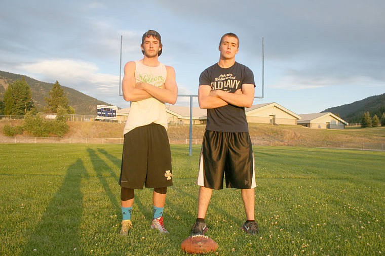 <p>Superior starting quarterback Wyatt Zylawy, left, and guard Aaron Kelly say the team is ready to get to work on the 2014-15 season. </p>