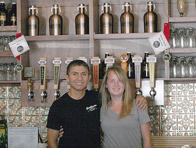 &lt;p&gt;Servers Sergio Medina, who&#146;s been with the brewery since they opened, and Shawna Auge, one of six recent hires.&lt;/p&gt;