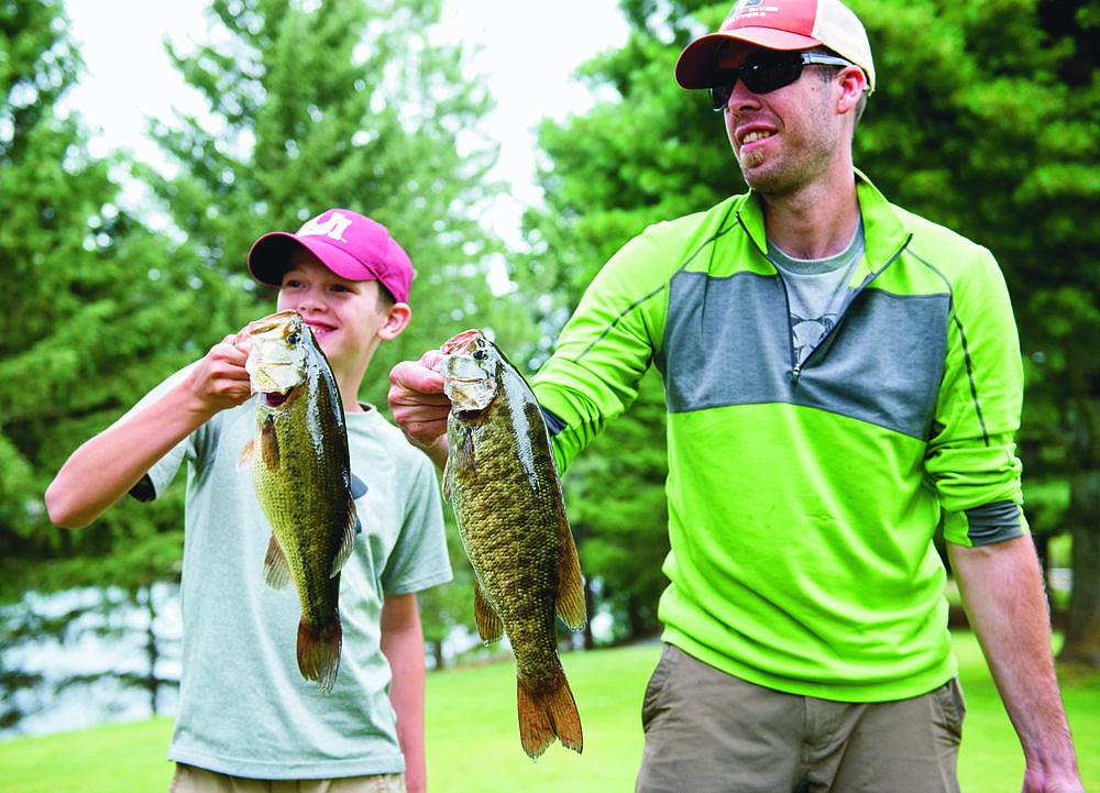 &lt;p&gt;Zane Carter (left) and TJ Carter (right) hold up two of their fish at the Tri-State Tournament last weekend.&lt;/p&gt;