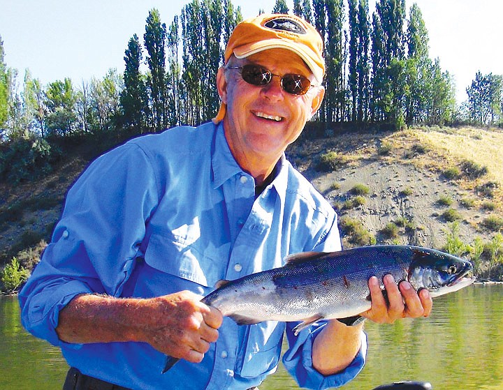 Rollie Schmitten of Lake Wenatchee holds one of several sockeye we landed while fishing in the Brewster Pool. Anglers that are on the water at the crack of dawn have the best success here right now.