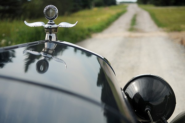 Detail of the hood ornament as David Cooley takes his 1926 Ford Model on Tuesday in Creston.