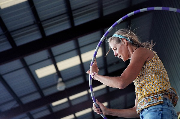 &lt;p&gt;Lake Dana Casper of Martin City adds a hula hoop to her dance at the Somers Cajun Street Dance on Saturday, July 21.&lt;/p&gt;