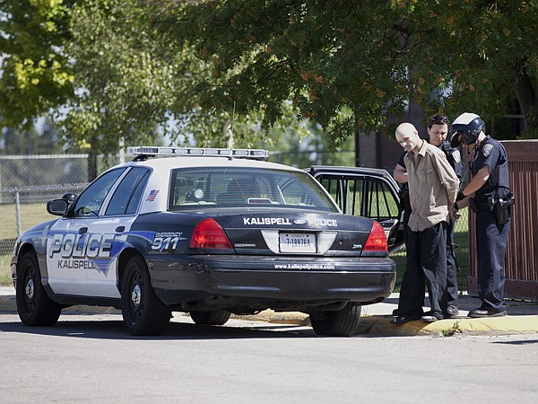 &lt;p&gt;Kalispell police officers arrest a suspect after receiving reports of an armed man on Wednesday in Kalispell. Sergeant Dave Overman says they found an AR-15 air-soft gun, the suspect was arrested for outstanding warrants.&lt;/p&gt;