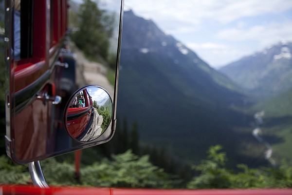 &lt;p&gt;The view from the Big Red Bus looking over McDonald Creek from Going to the Sun Road. A number of tours are offered to guests, with room for 17 passengers on each bus.&lt;/p&gt;