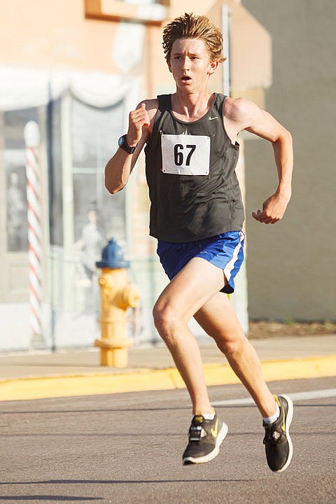 &lt;p&gt;First-place finisher Troy Fraley eyes the finish line Saturday morning during the Boogie to the Bank 5K run in Columbia Falls. Saturday, July 28, 2012 in Columbia Falls, Montana.&lt;/p&gt;