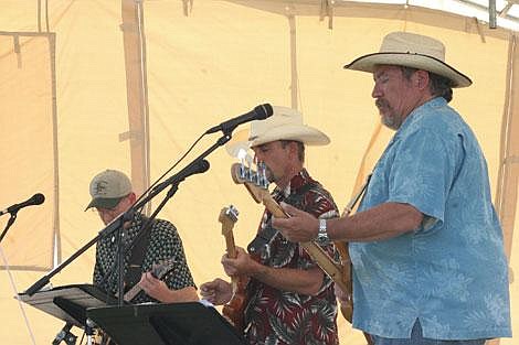 Jason Shueh/Valley Press Dave Stang, left, Mark Duboise, center, and Jeff Rockwood, right, are a Missoula based country band called Son of Gun.