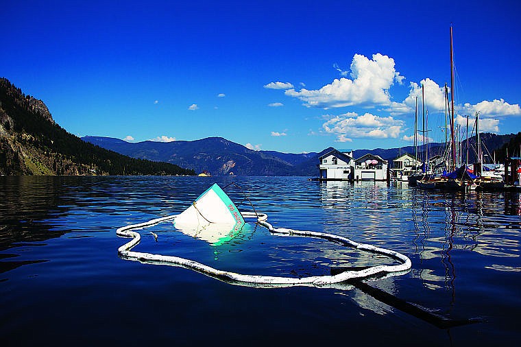 &lt;p&gt;After an explosion on board, a Tollycraft cabin cruiser boat rests, half-submerged in Lake Pend Oreille.&lt;/p&gt;