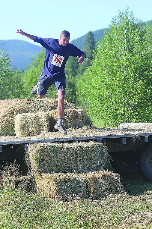 &lt;p&gt;Hayden Griffith jumps over a hay bale during the Naegeli Ranch Run on Saturday in Thompson Falls.&lt;/p&gt;