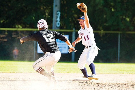 &lt;p&gt;Darnell Metcalf of the Cardinals gets stuck between second baseman Jesse O'Hagen of the Coeur d'Alene Lumbermen and third during a play at McEuen field Sunday afternoon.&lt;/p&gt;