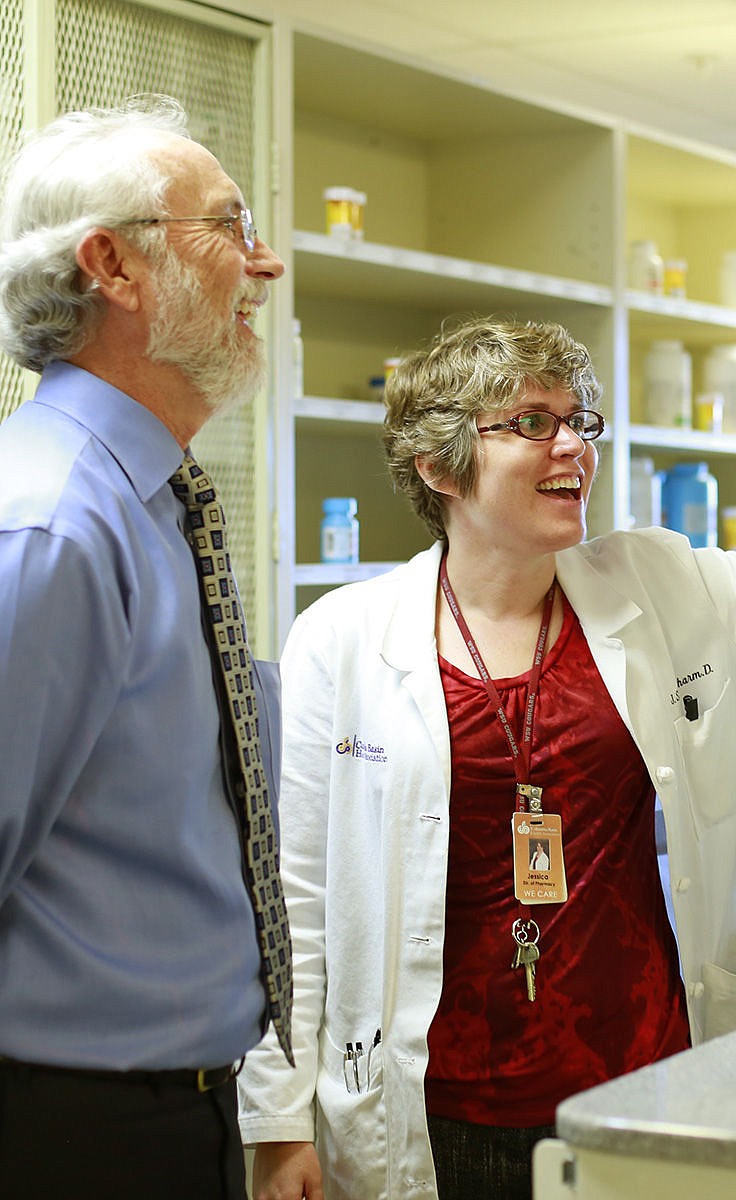 Congressman Dan Newhouse, R-Sunnyside, visits the CBHA clinic in Othello. Director of Pharmacy, Jessica Smith, showing Congressman Dan Newhouse how Othello Family Clinic dispenses medications during his visit last Friday.