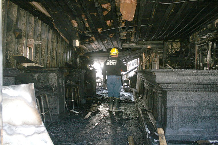 &lt;p&gt;Deputy State Fire Marshal Pat Clinch assesses the scene at the American Legion after the post burned down early Wednesday morning. The investigation of the cause of the fire is ongoing.&#160;&lt;/p&gt;