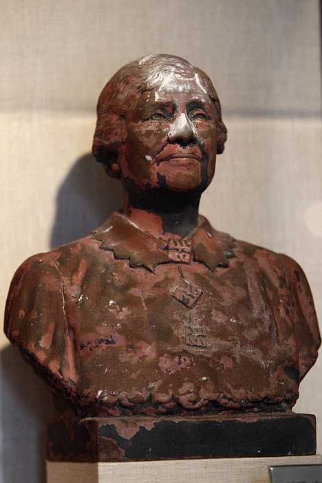 <p>A bust of Helen Keller, scorched and covered in World Trade Center dust, on display in New York on June 24.</p>