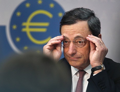 &lt;p&gt;President of European Central Bank Mario Draghi adjusts his glasses during a press conference in Frankfurt, Germany, Thursday, July 5, 2012. The European Central Bank has cut its key interest rate by a quarter percentage point to a record low of 0.75 percent to boost a eurozone economy weighed down by the continent's crisis over too much government debt. The move followed a rate cut by China's central bank and new stimulus measures by the Bank of England as global financial authorities seek to shore up a slowing global economy. European leaders last week agreed on new steps to strengthen market confidence in their shared euro currency bloc. They agreed to set up a single banking supervisor to keep bank bailouts from bankrupting countries and made it easier for troubled countries to get bailout help. Those steps helped calm financial markets, which have expected the ECB to follow up with more help in the form of a rate cut. (AP Photo/Michael Probst)&lt;/p&gt;