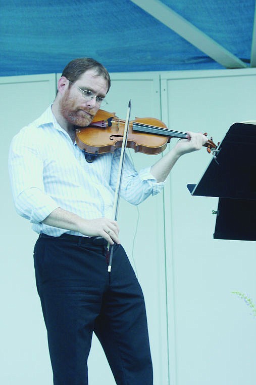 &lt;p&gt;Greg Ewer plays the violin during the Baroque Festival last week held near Paradise. The festival was celebrating its tenth year.&lt;/p&gt;