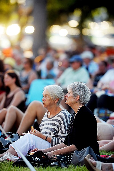 <p>Kalispell artist Karen Leigh and others enjoy the opening outdoor concert of Festival Amadeus on July 22, 2012, in Whitefish. (Brenda Ahearn/Daily Inter Lake)</p>