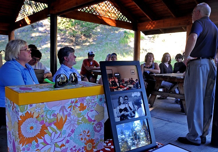 Daily Inter Lake Publisher Rick Weaver begins the remembrance of coworkers Erika Hoeffer and Melissa Weaver with fellow Inter Lake coworkers and a few friends of the two women at Lone Pine State Park Thursday evening.