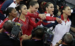 &lt;p&gt;U.S. gymnasts, from left to right, Gabrielle Douglas, Alexandra Raisman, Jordyn Wieber, McKayla Maroney and Kyla Ross react as they watch the screen that displays results declaring them winners of the gold medal during the Artistic Gymnastic women's team final at the 2012 Summer Olympics, Tuesday, July 31, 2012, in London. (AP Photo/Gregory Bull)&lt;/p&gt;