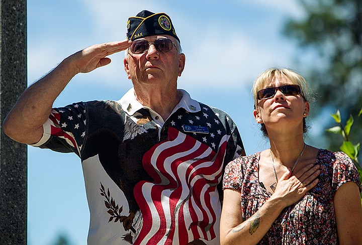 &lt;p&gt;TESS FREEMAN/Press&lt;/p&gt;&lt;p&gt;Lew Allert and Theresa Hart salute the American flag in honor of Nick Newby and Nate Beyers at the R.D. Rankin Veterans Memorial Plaza on Tuesday afternoon.&lt;/p&gt;