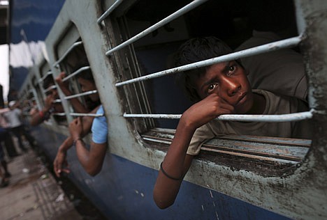 &lt;p&gt;A young Indian boy watches from a window of a stalled train as he waits for the train to resume its services following a power outage at a railway station in New Delhi, India, Tuesday, July 31, 2012. India's energy crisis cascaded over half the country Tuesday when three of its regional grids collapsed, leaving 620 million people without government-supplied electricity for several hours in, by far, the world's biggest blackout. Hundreds of trains stalled across the country and traffic lights went out, causing widespread traffic jams in New Delhi. (AP Photo/Kevin Frayer)&lt;/p&gt;