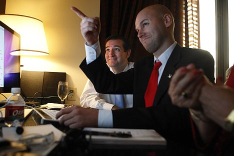 &lt;p&gt;U.S. Senator candidate Ted Cruz, left, and his general consultant Jason Johnson look at early returns in his war room at the JW Marriott in the Galleria during his runoff election against rival Republican Lt. Gov. David Dewhurst for the U.S. Senate seat vacated by Kay Bailey Hutchison Tuesday, July 31, 2012, in Houston. (AP Photo/Houston Chronicle, Johnny Hanson)&lt;/p&gt;