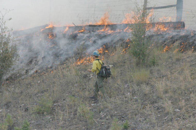 &lt;p&gt;Firefighters work to suppress the blaze of the Lozeau Bridge Fire, a fire which has already claimed two structures.&#160;&lt;/p&gt;