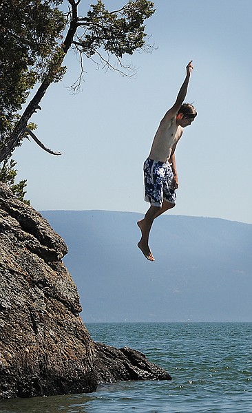 &lt;p&gt;Alex Weaver, 16, jumps into Flathead Lake from the West Shore
near Somers on Sunday.&lt;/p&gt;