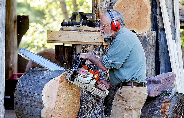 &lt;p&gt;Secrest uses a chain saw as he begins to shape a log into one of
his spherical sculptures on Thursday. All of Secrest&#146;s pieces are
handmade using chain saw, chop shaw and planer before being sanded
and finished.&lt;/p&gt;