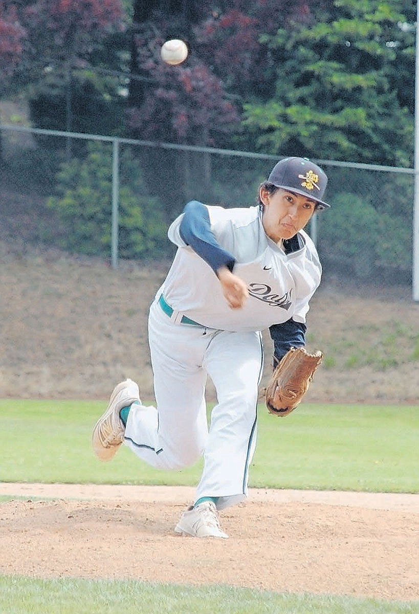 Columbia Basin pitcher Vance Alvarado, of the North Washington State Champion River Dogs, hurls a pitch in the second inning Sunday against Kelso.