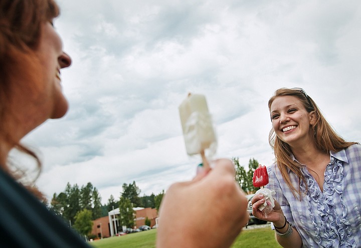 &lt;p&gt;SHAWN GUST/Press Katie Lien, senior administrative assistant of development and the North Idaho College Foundation, right, enjoys a juice pop with Chantel Black, assistant registrar with the college, on Tuesday at Eisenwinter Soccer Field on the school's campus. The employee appreciation event, put on by the NIC Human Resources Department, was intended to remind staff to keep cool this summer by distributing frozen treats.&lt;/p&gt;