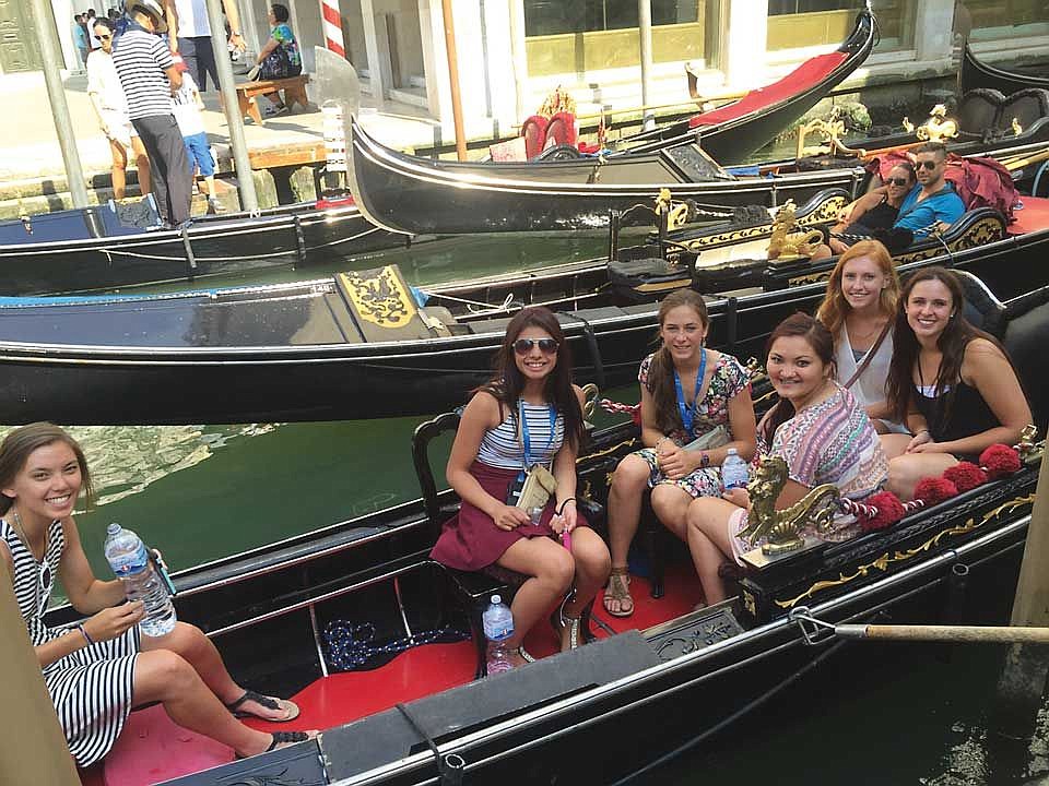 Taking a break from the Italian heat, which hit over a 100 degrees during our journey, several DeSales girls enjoy a traditional gondola ride around the city of Venice.