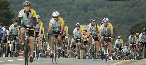 &lt;p&gt;Bicycle riders leave Sturbridge, Mass., along U.S. Route 20 at the start of the Pan-Mass Challenge. The annual 190-mile event from Sturbridge to Provincetown, to raise money for cancer research and treatment, is scheduled for today, Aug. 2, to Sunday Aug. 3.&lt;/p&gt;