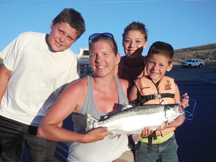 Sabrina Haley, of Yakima (pictured with her nieces and nephews), caught this nice trout using power eggs.