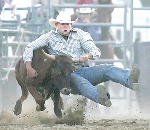 &lt;p&gt;Stan Branco of Chowchilla, Calif., turns in a time of 4.6 in the steer wrestling event Saturday evening.&lt;/p&gt;