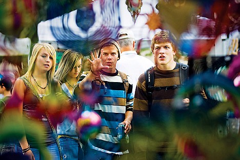 &lt;p&gt;From left, Zoey Damm, Jamie Devel, Jeff Thompson, and Greyson Turner stop to check out &quot;Eye Catchers&quot; at a booth during the Downtown Street Fair in Coeur d'Alene.&lt;/p&gt;