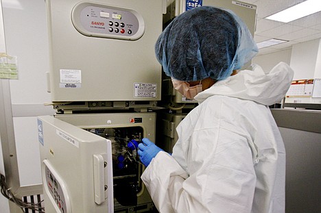 &lt;p&gt;In this photo taken July 26, 2010, a Lab Technician places stem cell samples into a incubator where the cells will be grown and multiplied by millions inside the GMP Lab at the Life Source Cryo Bank a subsidiary company of TCA Cellular Therapy L.L.C. in Covington, La.&lt;/p&gt;