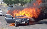 Car catches fire with family inside