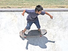 8-year-old Isiah Josph, of Polson, rides the wall during SkateJam last weekend in Polson.