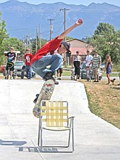 Stan Ferraro, of Polson, attempts to clear a lawn chair during SkateJam last weekend in Polson.