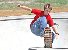 Isaac Knudsen, of Polson, hits the lip during SkateJam last weekend in Polson.