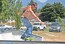 Erik Johnson, of Polson, grinds on a rail during Skatejam last weekend in Polson.