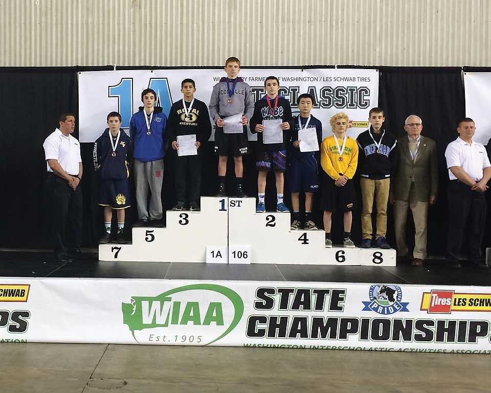 On the no. 3 step, he poses with his third-place medal at state.