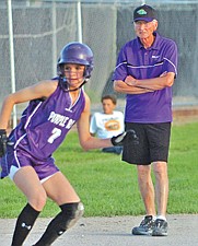 Polson softball coach Larry Smith won his fourth coach of the year award in 2010 after taking home a state championship trophy.