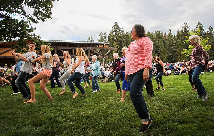 &lt;p&gt;Concert in the park attendees line-dance as Kelly Hughes Band performs Saturday evening at McEuen Park.&lt;/p&gt;