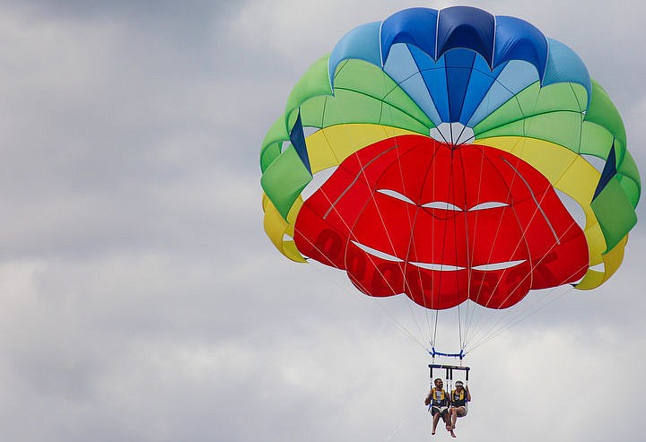 &lt;p&gt;Miguel and Nicole Parsons of Coeur d'Alene para-sail over Lake Coeur d'Alene Tuesday.&lt;/p&gt;