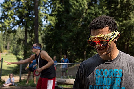 &lt;p&gt;Gonzaga University combo guard Bryan Alberts, right, and teammmate Kyle Wiltjer, left, play a game of &quot;Silent Opera&quot; blindfolded on Monday during the basketball team's visit to the camp at YMCA Camp Reed. The week-long camp is directed towards families affected by childhood cancer, and Gonzaga athletes have visited the camp every year.&lt;/p&gt;